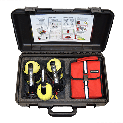 An three user system case containing three Headsets and one ComHub.