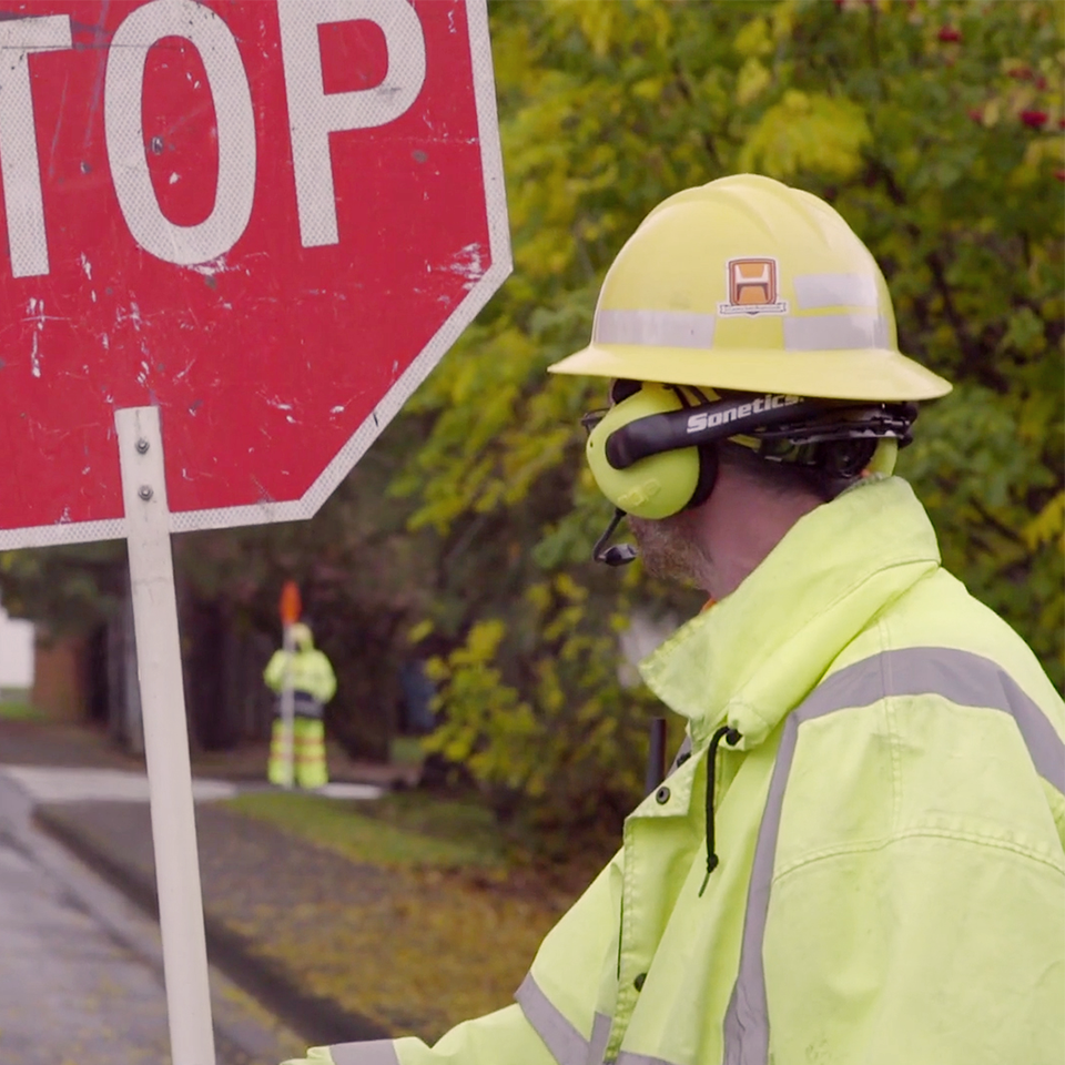 Public works traffic controller using Apex Team Wireless Headsets.