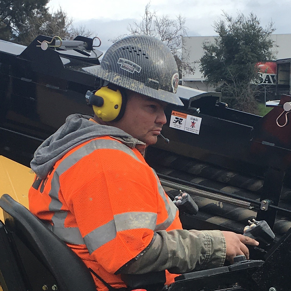 Directional drill operator wearing Apex Team Wireless Headsets.