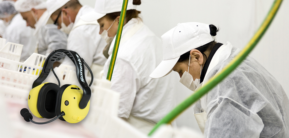 Sonetics Headset pictured with workers in a food processing factory