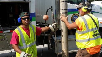 Public works team members wearing wireless headset