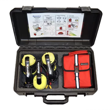 An three user system case containing three Headsets and one ComHub.