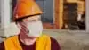 Construction worker wearing N95 mask on the jobsite.