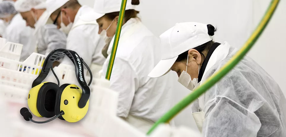 food-proc-with-headset-overlay-965x463-1 Sonetics Headset pictured with workers in a food processing factory